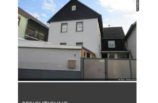 Einfamilienhaus kaufen in 35423 Lich, Einfamilienhaus mit Hofbereich und Garage zu verkaufen