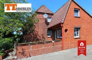 Haus kaufen in 26388 Voslapp, TT bietet an: Schöne Siedlungshälfte mit Garage in Voslapp!