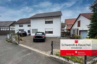 Einfamilienhaus kaufen in 35327 Ulrichstein, Einfamilienhaus mit zwei Garagen und separatem Gartengrundstück in Ulrichstein-Wohnfeld