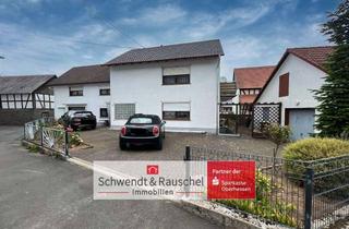 Einfamilienhaus kaufen in 35327 Ulrichstein, Einfamilienhaus mit zwei Garagen und separatem Gartengrundstück in Ulrichstein-Wohnfeld