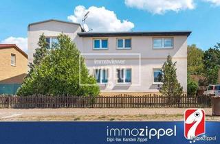 Haus kaufen in 16230 Britz, Anlageobjekt in Britz b.Eberswalde: MFH mit 5 Wohnungen, 5 Garagen, voll vermietet, 1.407 m² Grdstck