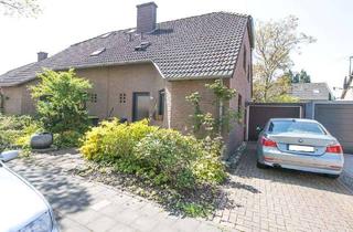 Haus kaufen in 41179 Dorthausen, Solide und gut aufgeteilte DHH mit Keller u. Garage