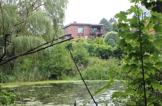 Haus kaufen in 23689 Ratekau, Hangbungalow über 2 Etagen in TOP-Lage von Pansdorf