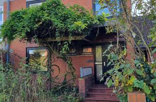 Haus kaufen in 24782 Büdelsdorf, Architektenhaus mit Raum für die große Familie und verwunschenem Garten