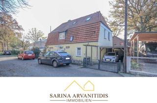 Haus kaufen in 28865 Lilienthal, Lilienthal - Zweifamilienhaus mit Potenzial in idyllischer Lage