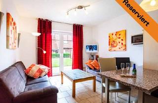 Wohnung kaufen in 26427 Werdum, Werdum: Ferienhaus im Reihenmittelhauscharakter mit Terrasse