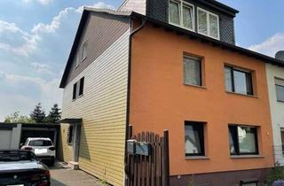 Haus kaufen in 40764 Langenfeld (Rheinland), Attraktives Dreifamilienhaus mit Garten und Garage in Langenfeld-Richrath