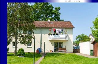 Doppelhaushälfte kaufen in 32339 Espelkamp, Zweifamilien-Doppelhaushälfte mit Garten in Espelkamp