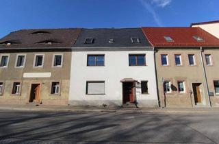 Haus kaufen in 09328 Lunzenau, Gepflegtes Reihenmittelhaus mit Garten bereit zur Modernisierung
