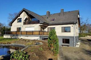 Haus kaufen in 65611 Brechen, Großes Zweifamilienhaus mit PV-Anlage, 5 Garagen und 1.964 m² Grundstück.