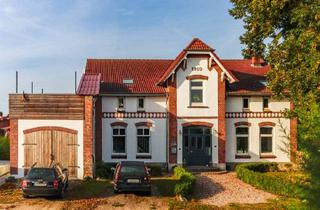 Villa kaufen in 24814 Sehestedt, Bürgervilla mit Baugrundstück und Kanalblick