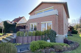 Haus kaufen in Birkenweg 24, 33758 Schloß Holte-Stukenbrock, Zweifamilienhaus | Gartentraum in zentraler Lage