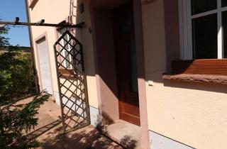 Wohnung kaufen in 04509 Delitzsch, 4-Zimmer-Eigentumswohnung mit Gartenanteil