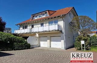 Wohnung kaufen in 65428 Rüsselsheim, Großzügige 4 Zimmer Dachgeschosswohnung mit Garage in ruhiger Lage von Königstädten