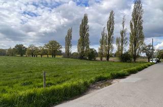 Grundstück zu kaufen in 47506 Neukirchen-Vluyn, Grünland in guter Lage umgeben von Häusern und Feldern.