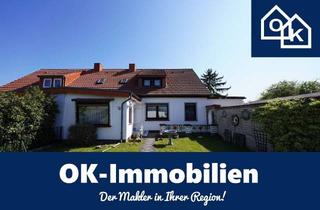 Haus kaufen in 39517 Mahlwinkel, Mahlwinkel – Kleine DHH mit 2 Garagen, Nebengebäuden und Garten