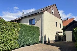 Einfamilienhaus kaufen in 61130 Nidderau, Gepflegtes Einfamilienhaus mit viel Potenzial und schönem Garten