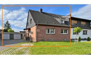 Haus kaufen in 46562 Voerde (Niederrhein), Viele Möglichkeiten: Traumhaftes Zweifamilienhaus in Voerde - Wohnen mit Stil und Potenzial!