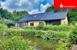 Einfamilienhaus kaufen in 25524 Oelixdorf, Top-gepflegtes Einfamilienhaus mit besonderem Grundstück in Sackgassenlage