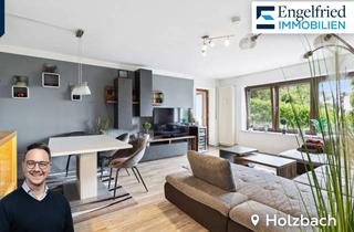 Wohnung kaufen in 55469 Holzbach, Ebenerdige Eigentumswohnung mit Ausblick, Terrasse, großer Garage und drei Stellplätzen
