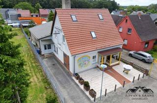Gewerbeimmobilie kaufen in 18356 Barth, Ihr charmantes Geschäftshaus an der Barthestraße - Profitieren Sie von der belebten Lage