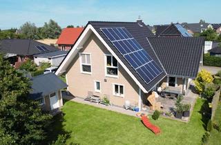 Einfamilienhaus kaufen in 25826 Sankt Peter-Ording, Zukunftssicher Wohnen: Modernes Energieeffizienzhaus mit Erdwärme & PV-Anlage