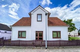 Haus kaufen in 27711 Osterholz-Scharmbeck, OHZ - Charmantes Haus mit Carpot und Keller auf großzügigen und sonnigem Grundstück