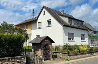 Einfamilienhaus kaufen in 55494 Rheinböllen, Rheinböllen - Freistehendes Einfamilienhaus mit Garage auf großem, voll bebaubarem Grundstück