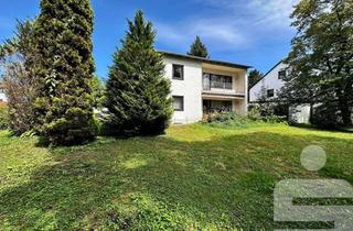 Haus kaufen in 82194 Gröbenzell, Zweifamilienhaus mit großem Grundstück in Gröbenzell