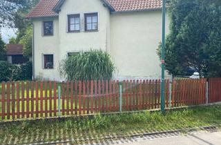 Wohnung kaufen in 04463 Großpösna, Große Erdgeschosswohnung in einem Zweifamilienhaus nähe Störmthaler See