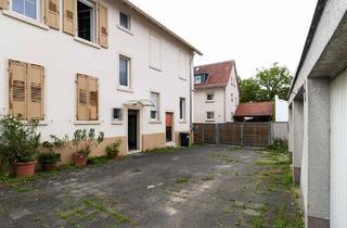 Haus kaufen in 64291 Arheilgen, 5-Familienhaus und Doppelbungalow auf einem Grundstück in Darmstadt-Arheilgen