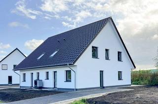 Doppelhaushälfte kaufen in 24644 Timmaspe, Neubau Doppelhaushälfte in Timmaspe - Erstbezug!