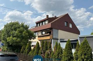 Haus kaufen in 73240 Wendlingen, 2-Familienwohnhaus mit Garten und Garage in zentraler Stadt-Lage von Wendlingen.