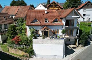 Einfamilienhaus kaufen in 66909 Steinbach, Freistehendes Einfamilienhaus mit sonniger Terrasse und geräumiger Garage in Steinbach am Glan