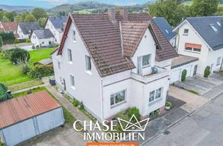 Doppelhaushälfte kaufen in 32676 Lügde, Charmante Doppelhaushälfte mit eigenem Garten und Garagen - Wohnen in TOP-Lage Lügdes!