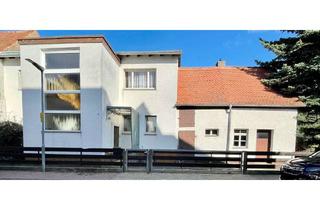 Einfamilienhaus kaufen in 63486 Bruchköbel, Bruchköbel Stadt: Gemütliches Einfamilienhaus mit großem Anbau