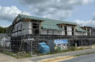 Wohnung kaufen in 26919 Brake, Neubau in Brake: ETW mit Balkon und Carport, PROVISIONSFREI
