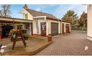 Haus kaufen in 04565 Regis-Breitingen, Frei werdendes und vielseitig nutzbares Zweifamilienhaus mit Garten und Garagen