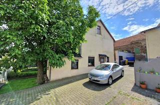 Haus kaufen in 56379 Dörnberg, Charmantes Einfamilienreiheneckhaus mit Nebengebäude in Dörnberg!