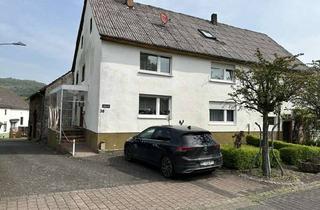 Haus kaufen in 54570 Oberstadtfeld, Oberstadtfeld: Einfamilienwohnhaus mit PKW-Garage und gemütlichen Gartengrundstück