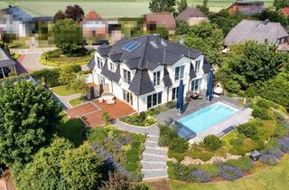 Villa kaufen in 29582 Hanstedt, Architekten-Villa mit hochklassiger Ästhetik, Spa-Bereich und Pool in ruhiger Lage