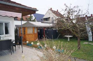 Haus kaufen in 64546 Mörfelden-Walldorf, Haus mit Terrasse und eigenem Garten, derzeit vermietet