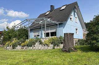Haus kaufen in 63607 Wächtersbach, **Einfamilienwohnhaus in Feldrandlage mit herrlichem Fernblick auf großem Grundstück**
