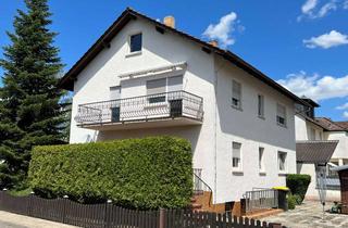 Haus kaufen in 64572 Büttelborn, Tolles Zweifamilienhaus mit Potenzial in zentraler Lage von Büttelborn/Worfelden!