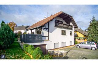 Einfamilienhaus kaufen in 56414 Hundsangen, Raum für die ganze Familie. Freistehendes Einfamilienhaus mit Dachausbau und Einliegerwohnung.