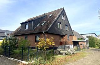 Haus kaufen in 28844 Weyhe, Gepflegtes und renoviertes Zweifamilienhaus in Weyhe-Erichshof