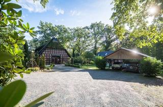 Einfamilienhaus kaufen in 27404 Heeslingen, Zeitloses Einfamilienhaus mit Ferienhof auf parkähnlichem Garten direkt an der Oste
