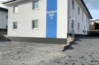 Haus kaufen in Ziegenhainer Str. 38, 34576 Homberg, Homberg (Efze) - Kernstadt: Attraktiver Neubau mit 4 Wohneinheiten zum Erstbezug