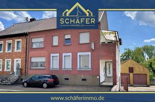 Haus kaufen in 66773 Schwalbach, Zweifamilienhaus mit großer Lagerhalle und weitläufigem Grundstück in Schwalbach OT zu verkaufen