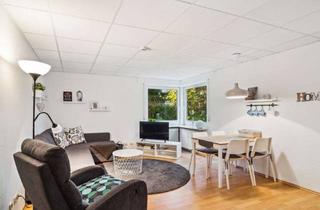 Wohnung kaufen in 65527 Niedernhausen, Moderne 2-Zimmerwohnung mit großem Gartenanteil und EBK